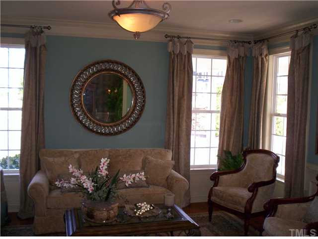 204 Ivyshaw Road Cary, NC 27519 - Photo 4 of 12 Formal Living room with lots of windows and trim detail