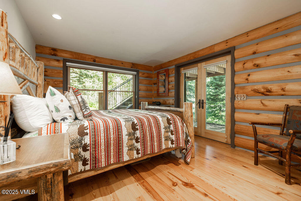 4454 Bellyache Ridge Road Wolcott, CO 81655 - Photo 16 of 48 a bed sitting in a bedroom next to a window