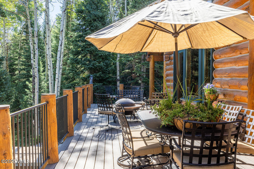 4454 Bellyache Ridge Road Wolcott, CO 81655 - Photo 26 of 48 a view of a chairs and table in the balcony