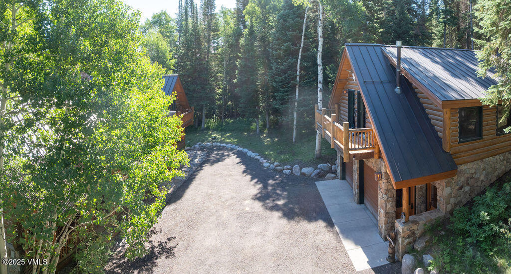 4454 Bellyache Ridge Road Wolcott, CO 81655 - Photo 40 of 48 a backyard of a house with lots of green space
