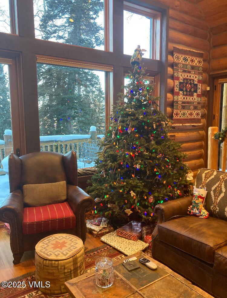 4454 Bellyache Ridge Road Wolcott, CO 81655 - Photo 4 of 48 a living room with furniture and a floor to ceiling window