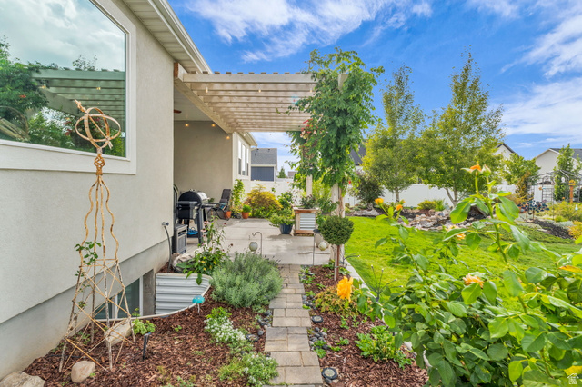 2454 West Jackson Street Mapleton, UT 84664 - Photo 46 of 63 Fenced backyard with a patio area and a pergola