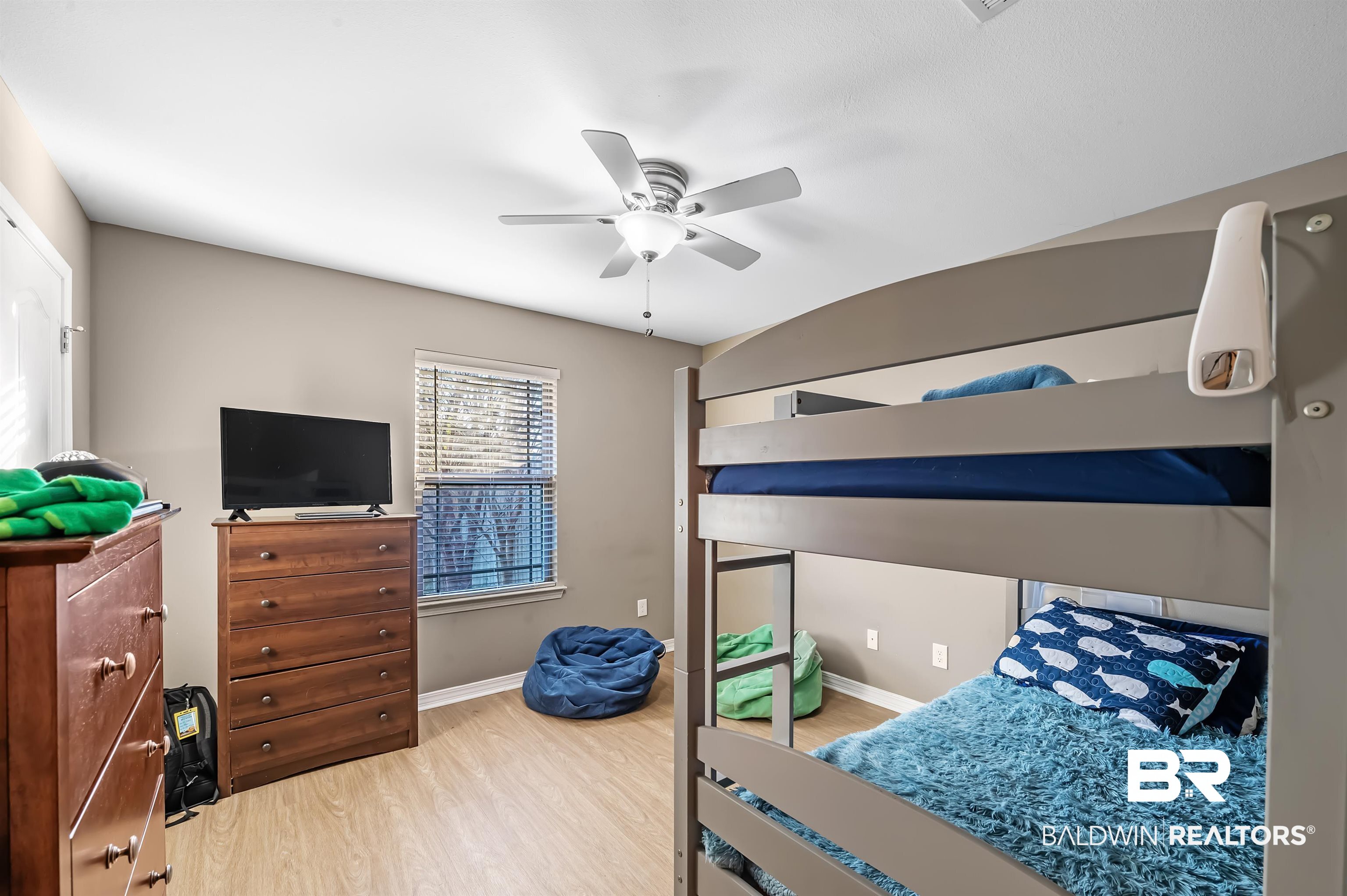 229 Meadow Run Loop East Foley, AL 36535 - Photo 29 of 31 Bedroom with ceiling fan and wood-type flooring
