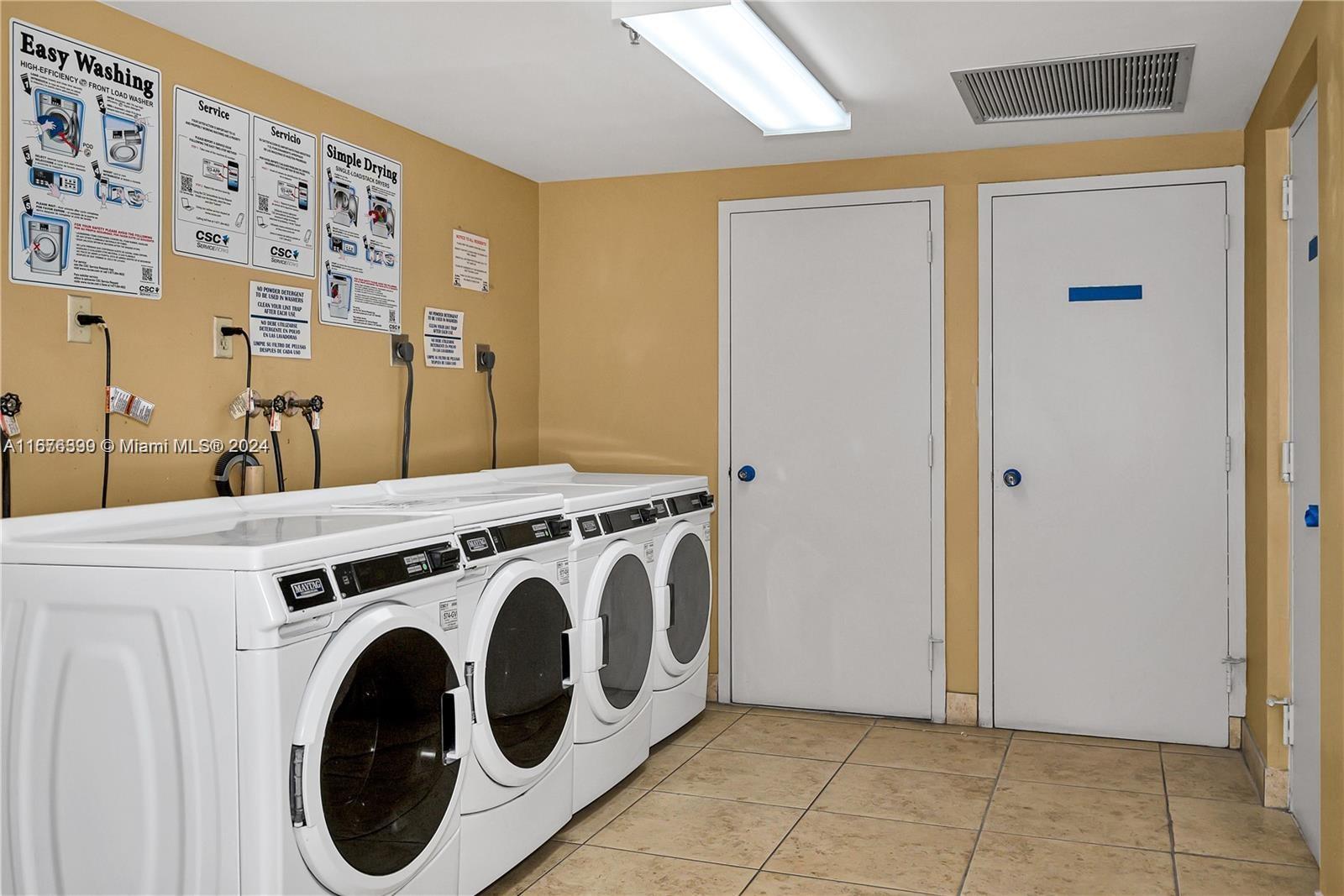 Hillcrest Hollywood, FL 33021 - Photo 28 of 37 a utility room with dryer and washer