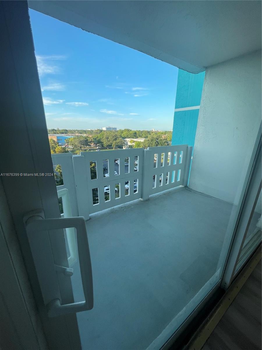 Hillcrest Hollywood, FL 33021 - Photo 7 of 37 a view of a balcony with furniture and city view