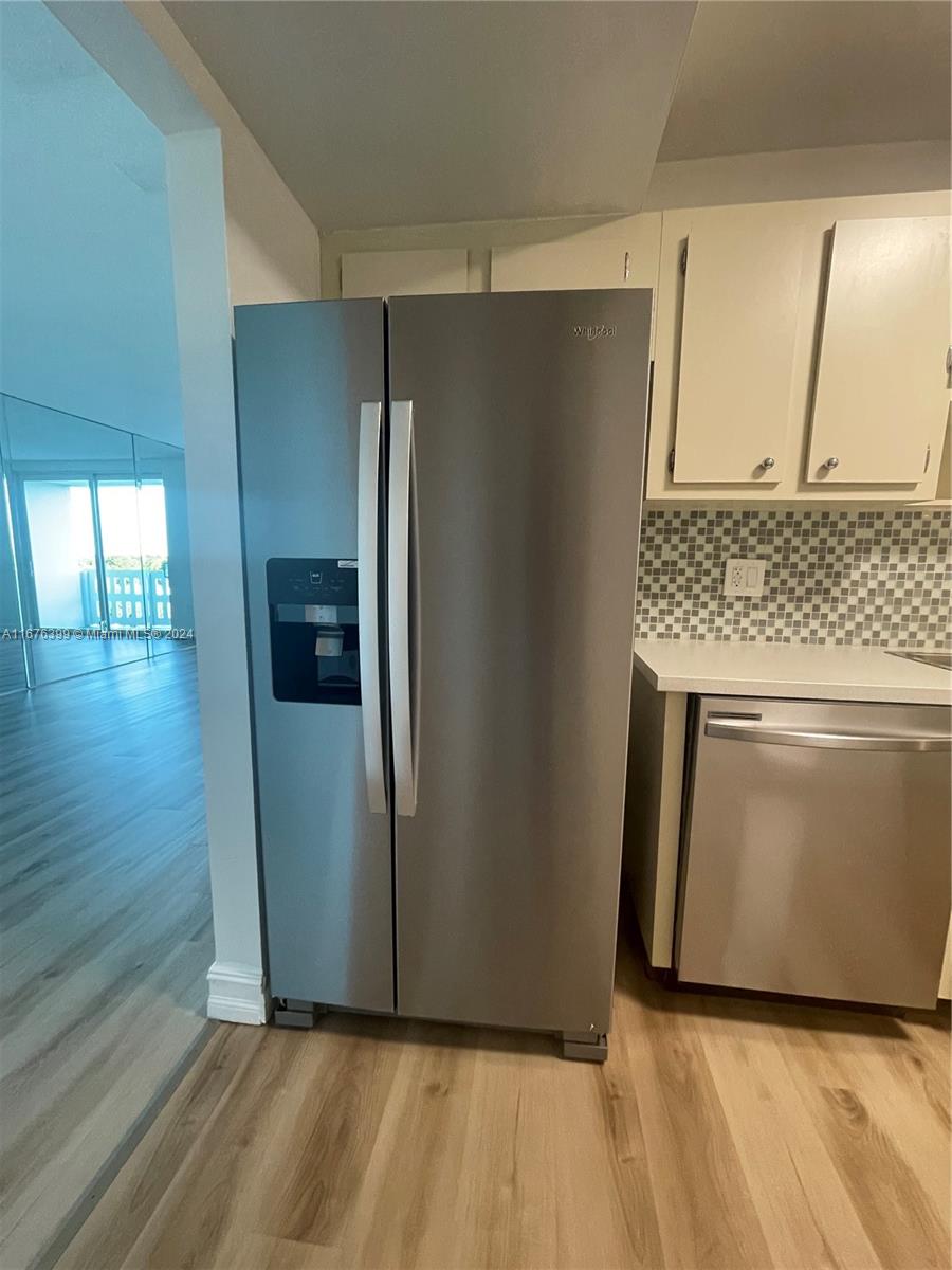 Hillcrest Hollywood, FL 33021 - Photo 9 of 37 a kitchen with stainless steel appliances granite countertop a refrigerator and a stove