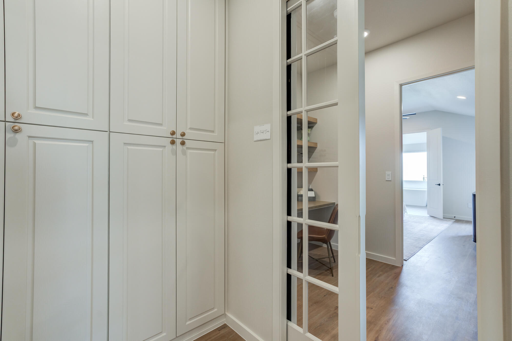3606 126th Place Lubbock, TX 79423 - Photo 28 of 59 a view of a hallway with wooden floor and closet