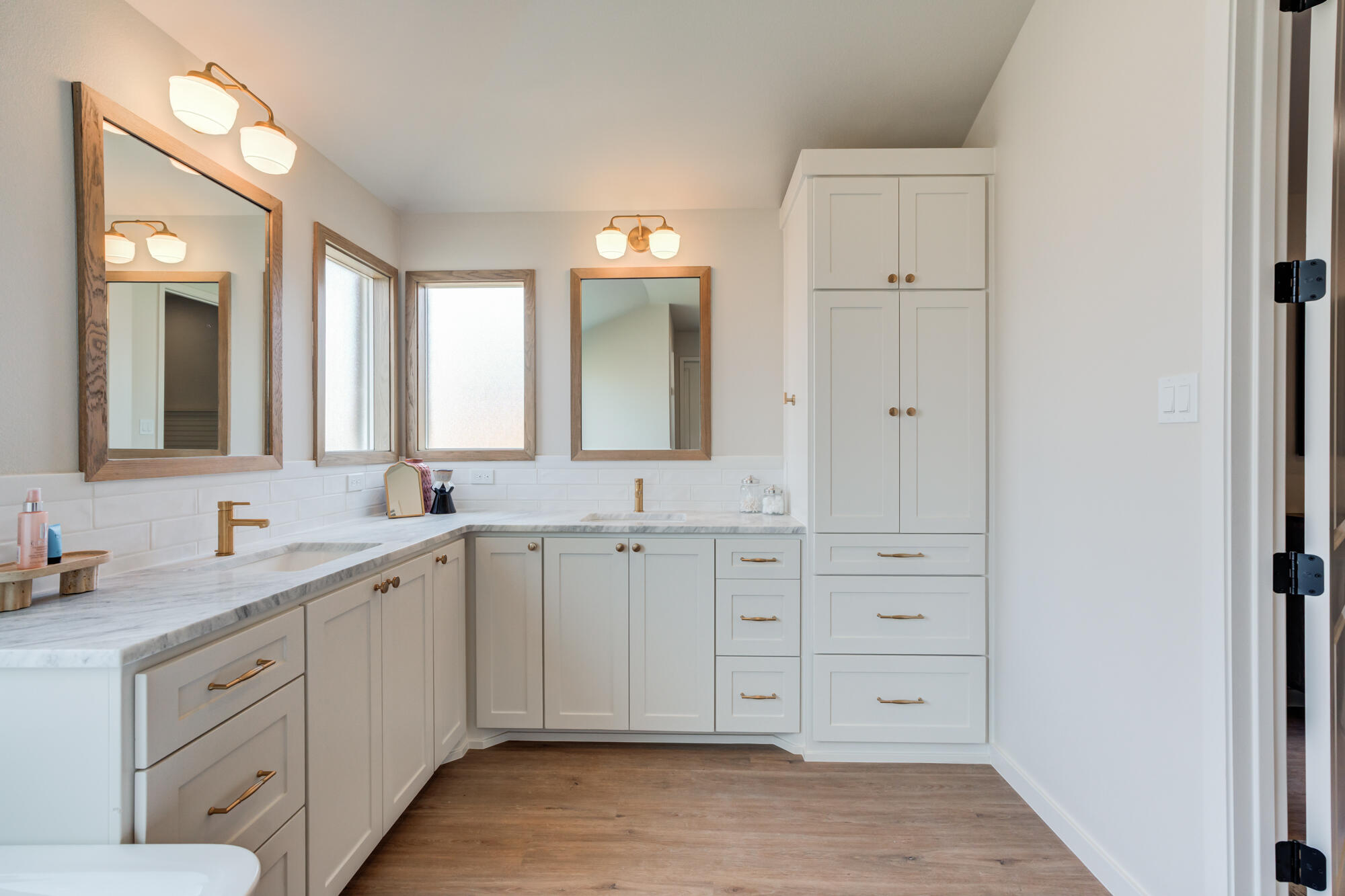 3606 126th Place Lubbock, TX 79423 - Photo 35 of 59 a spacious bathroom with a granite countertop sink and a mirror