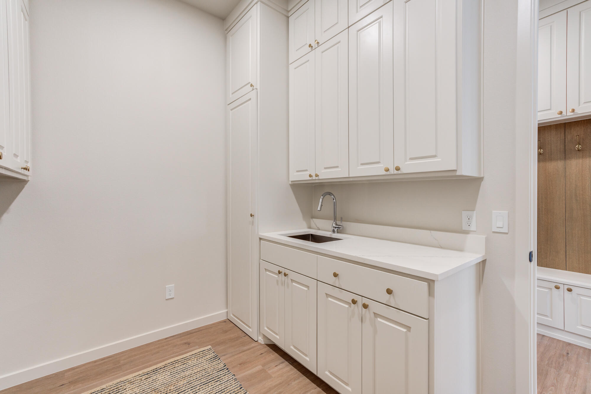 3606 126th Place Lubbock, TX 79423 - Photo 40 of 59 a view of cabinets with wooden floor