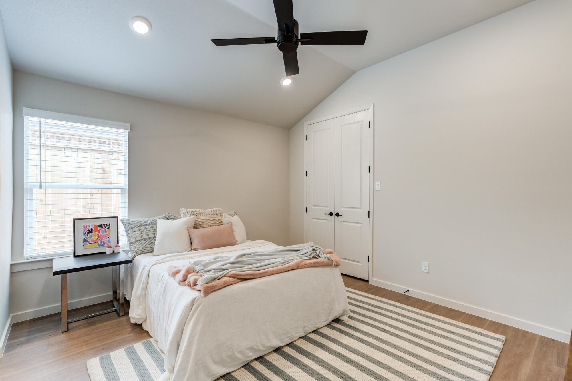 3606 126th Place Lubbock, TX 79423 - Photo 42 of 59 a bedroom with a bed and a window
