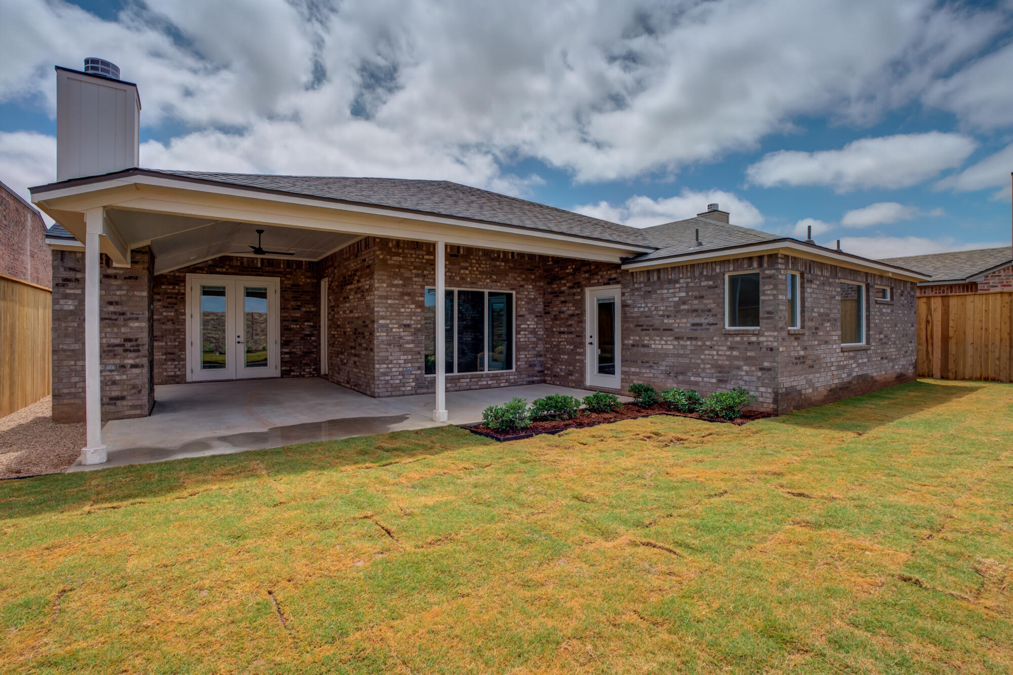3606 126th Place Lubbock, TX 79423 - Photo 58 of 59 a view of a house with swimming pool and porch