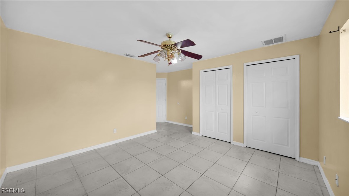 4551 22nd Street Southwest Lehigh Acres, FL 33973 - Photo 13 of 26 a view of an empty room