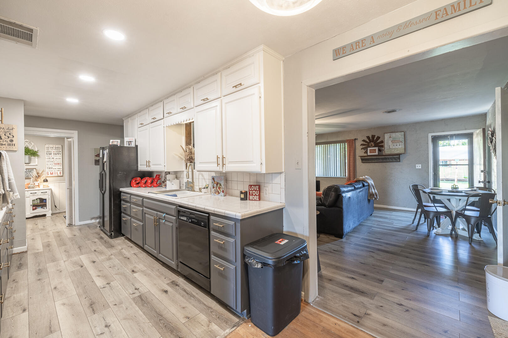 710 West 5th Street Post, TX 79356 - Photo 17 of 50 a kitchen with stainless steel appliances kitchen island granite countertop a stove and a refrigerator