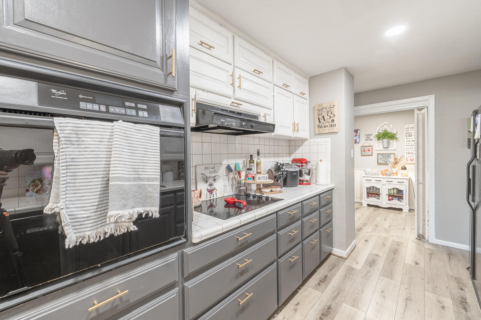 710 West 5th Street Post, TX 79356 - Photo 19 of 50 a kitchen with stainless steel appliances granite countertop a sink and wooden cabinets