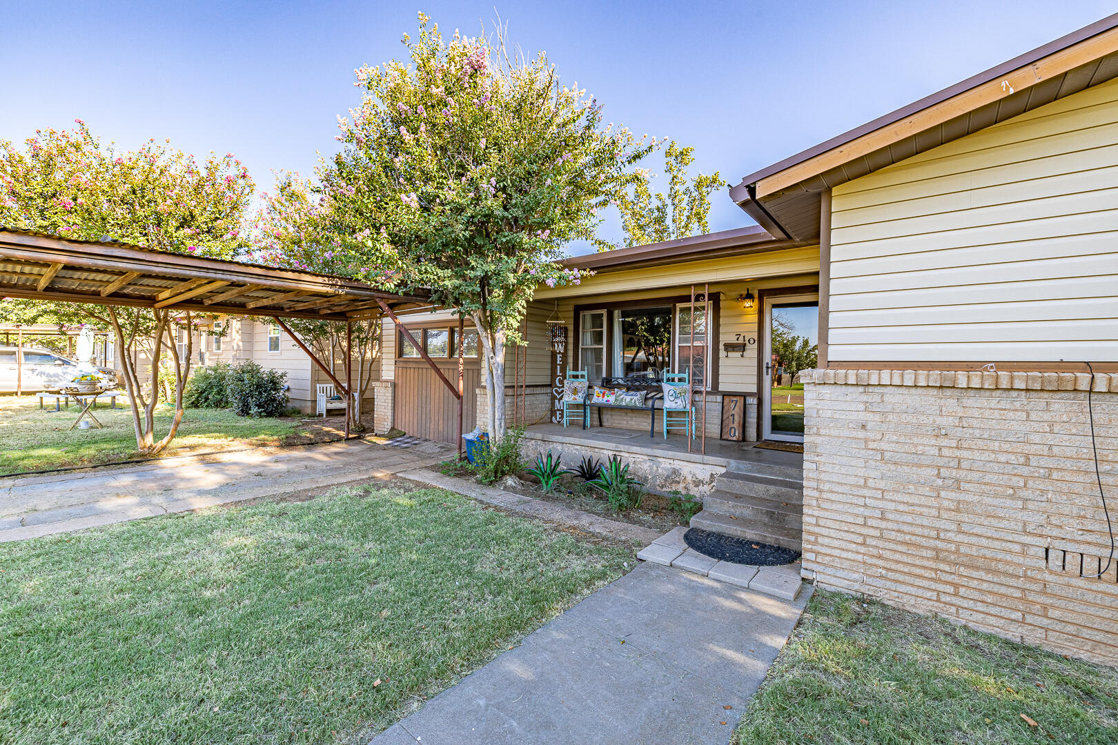 710 West 5th Street Post, TX 79356 - Photo 2 of 50 a view of a house with backyard and porch