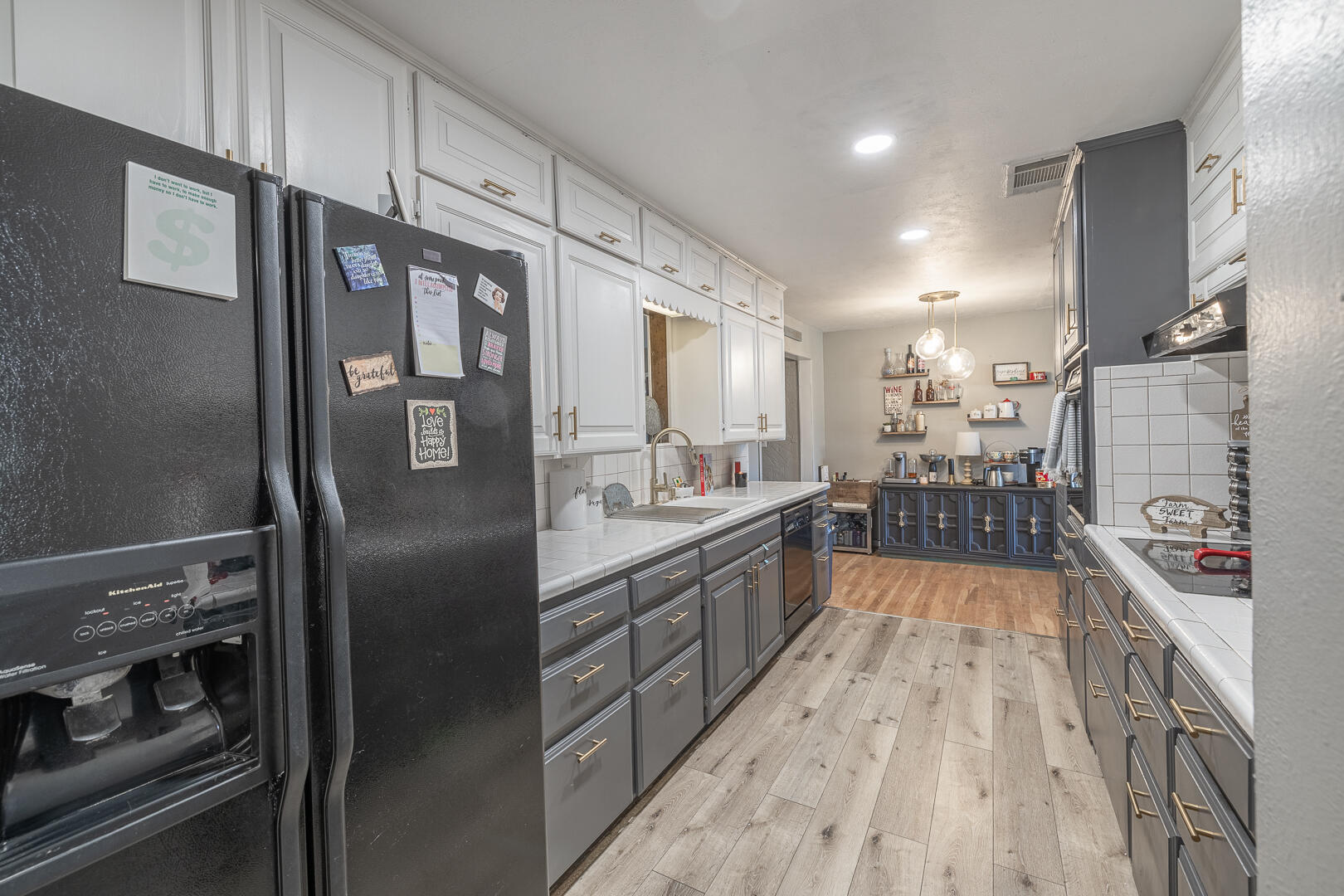 710 West 5th Street Post, TX 79356 - Photo 21 of 50 a kitchen with stainless steel appliances granite countertop a refrigerator and a stove