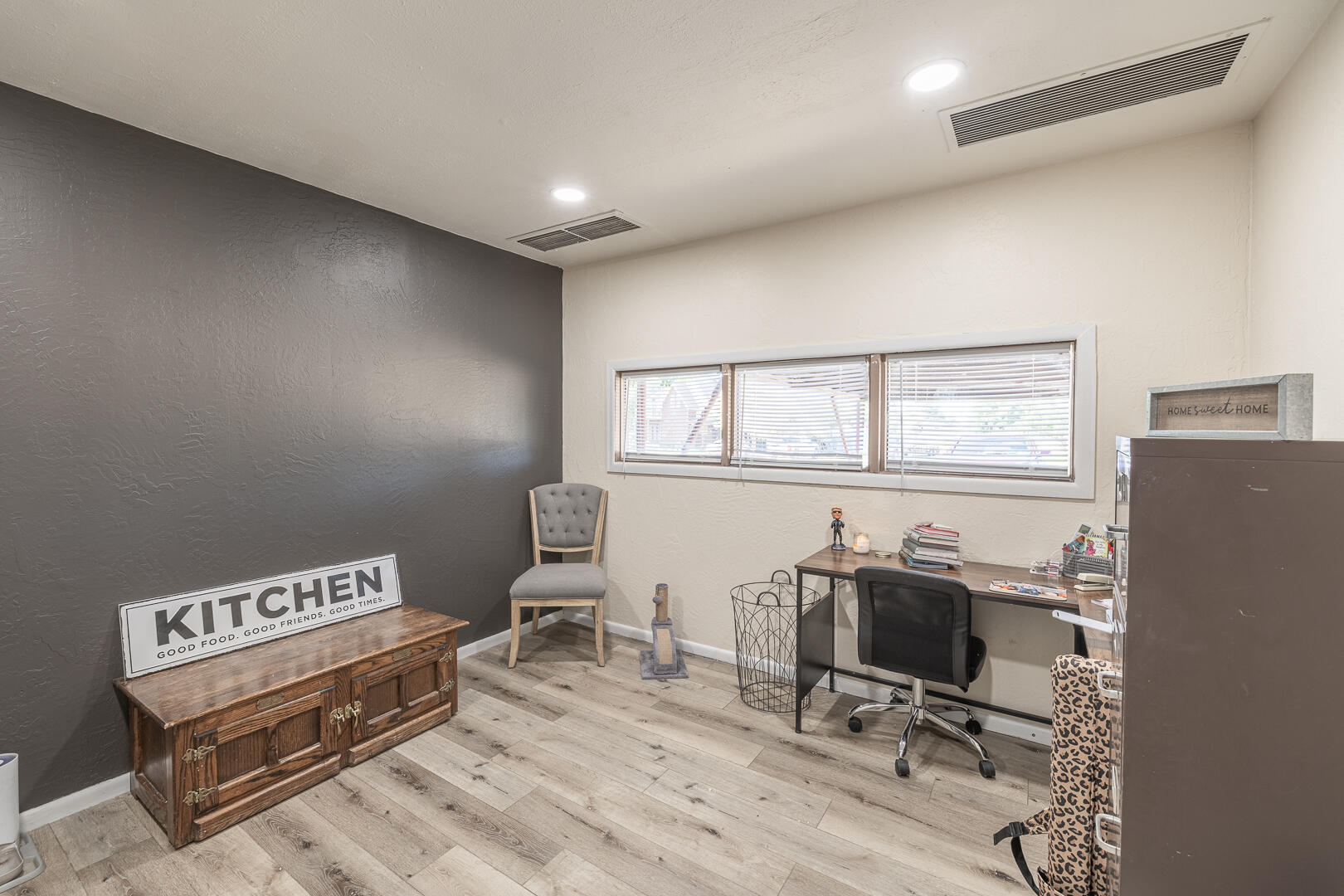 710 West 5th Street Post, TX 79356 - Photo 28 of 50 a view of a workspace with furniture and a window