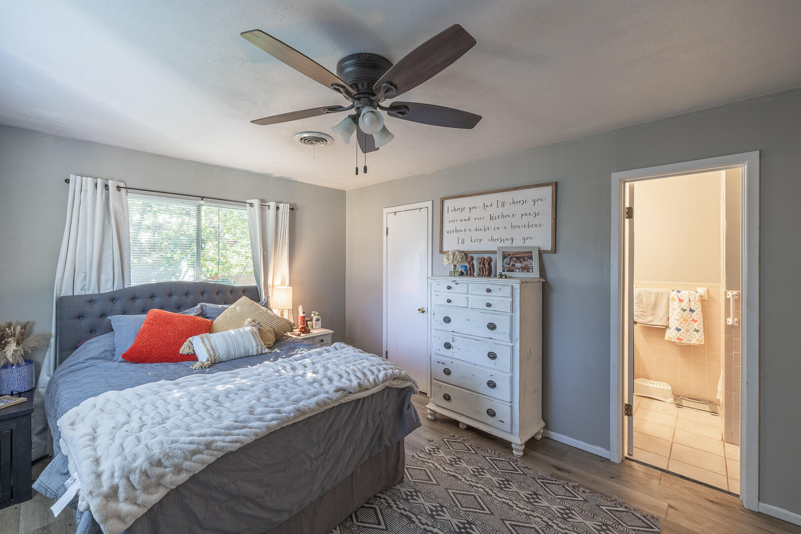 710 West 5th Street Post, TX 79356 - Photo 36 of 50 a bedroom with a bed and wooden floor