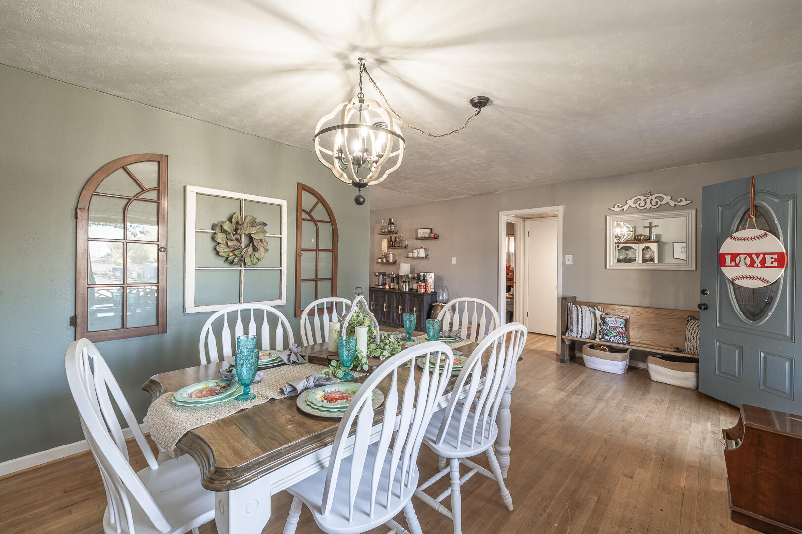 710 West 5th Street Post, TX 79356 - Photo 4 of 50 a view of a dining room with furniture wooden floor and chandelier