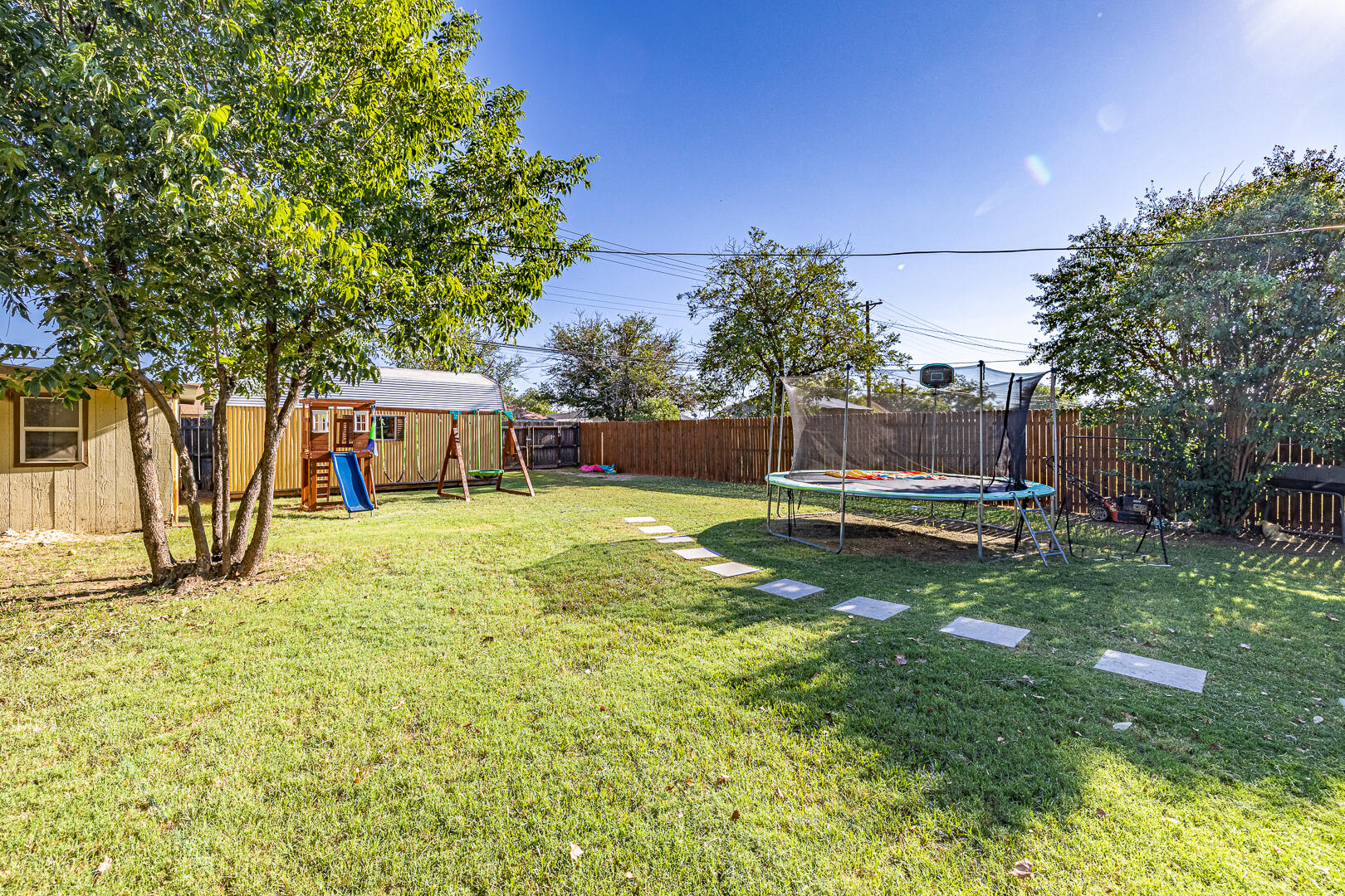 710 West 5th Street Post, TX 79356 - Photo 43 of 50 a view of a house with a yard
