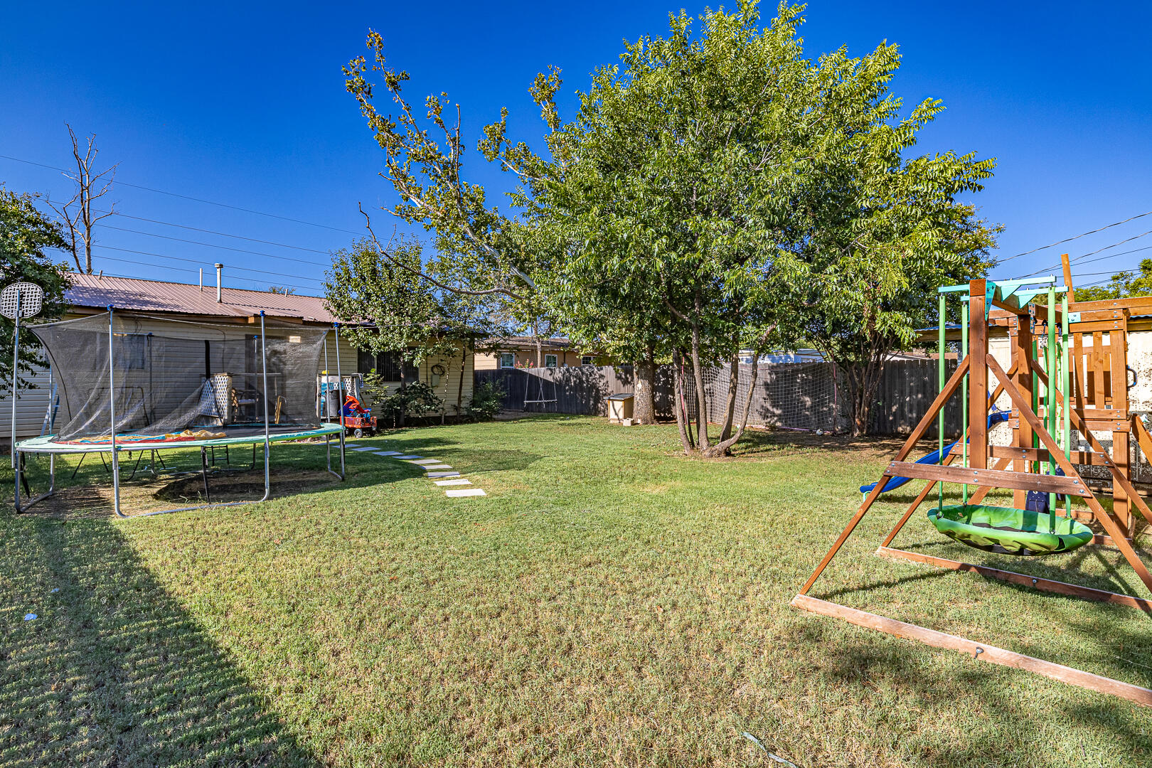 710 West 5th Street Post, TX 79356 - Photo 45 of 50 a view of a house with a yard and sitting area