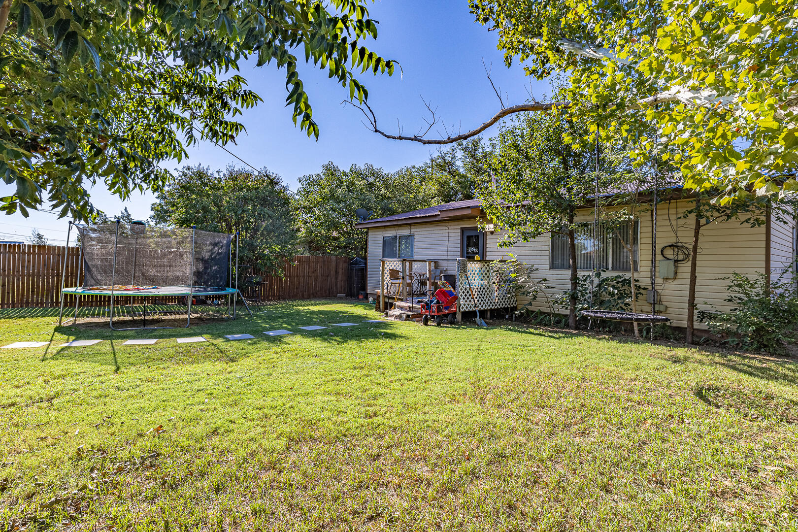 710 West 5th Street Post, TX 79356 - Photo 47 of 50 a view of a house with swimming pool and sitting area