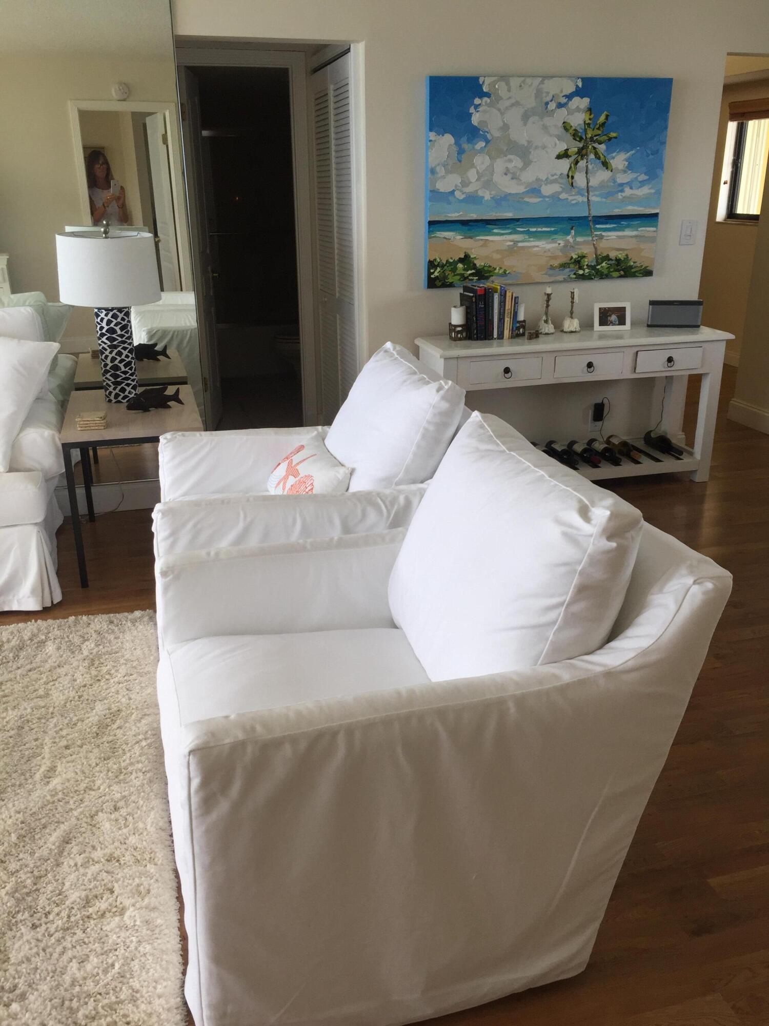 400 Ocean Trail Way, Unit 904 Jupiter, FL 33477 - Photo 25 of 31 a living room with furniture