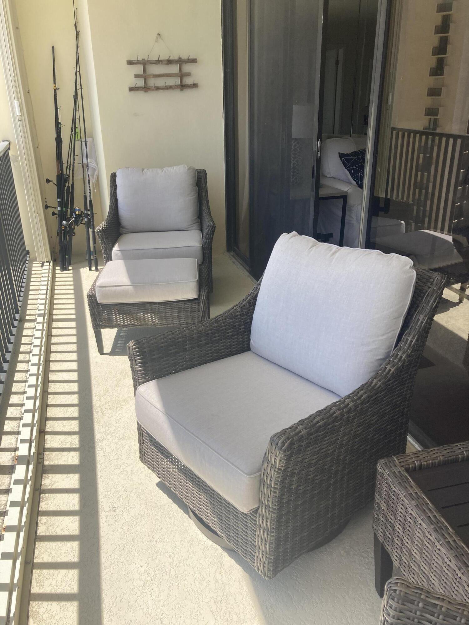 400 Ocean Trail Way, Unit 904 Jupiter, FL 33477 - Photo 4 of 31 a living room with furniture and a fireplace