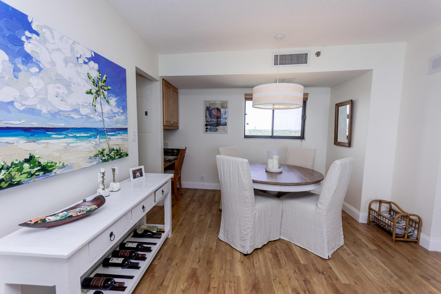 400 Ocean Trail Way, Unit 904 Jupiter, FL 33477 - Photo 10 of 31 a living room with furniture and a wooden floor