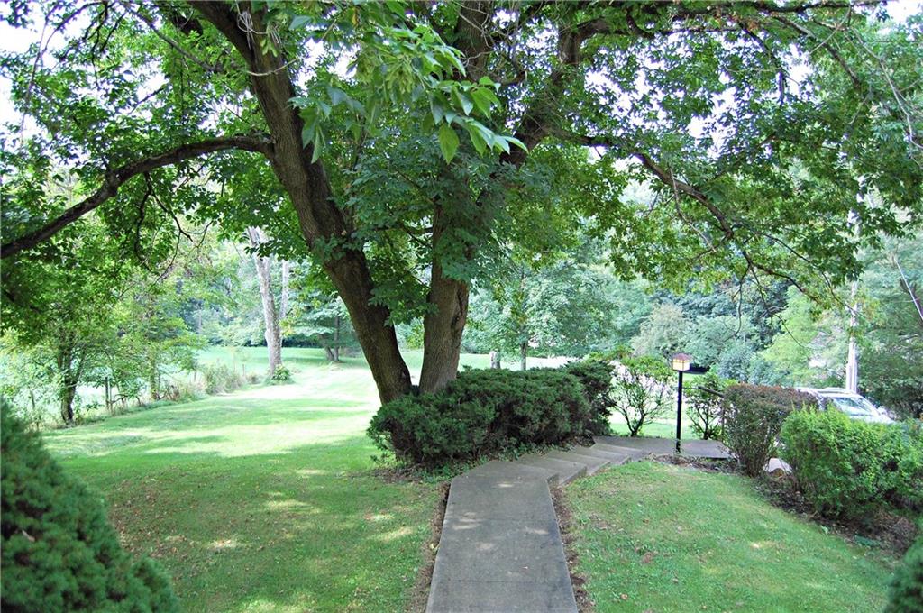 PLEASANT WALKWAY  TO THE FRONT DOOR