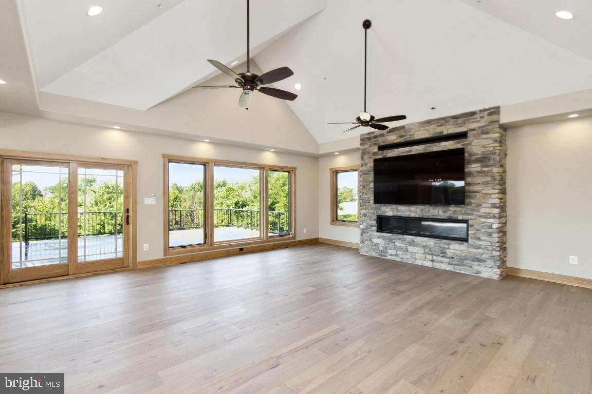 2075 Coon Club Road Westminster, MD 21157 - Photo 3 of 43 Great room with stone fireplace.
