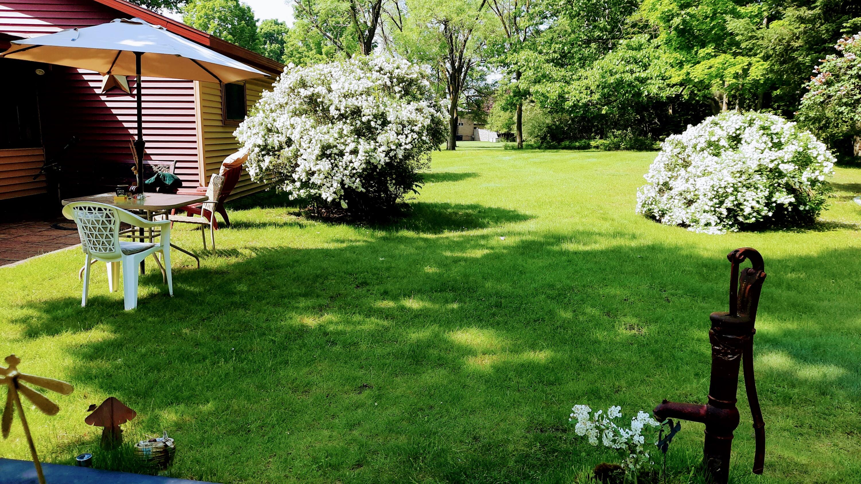 8424 3rd Street Onekama, MI 49675 - Photo 11 of 77 PRIVATE Backyard