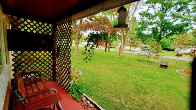 $420,000 | 8424 3rd Street, Onekama, MI 49675