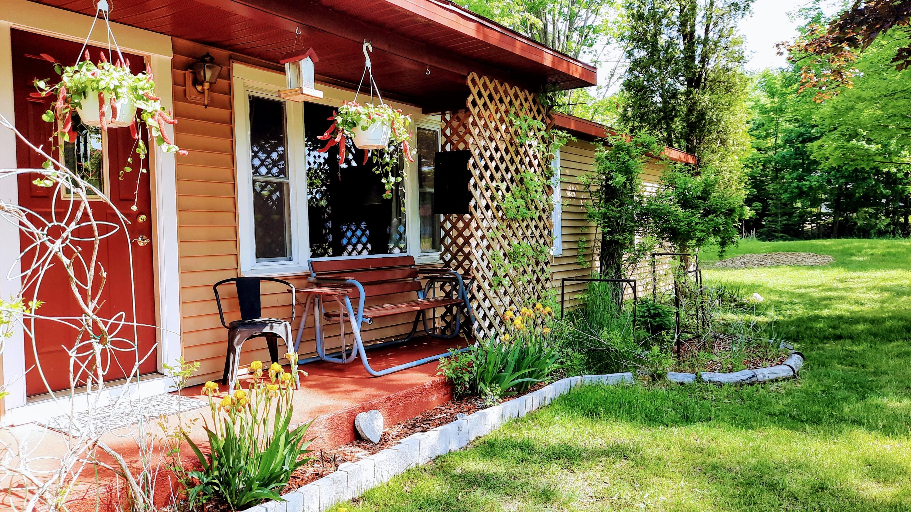8424 3rd Street Onekama, MI 49675 - Photo 14 of 77 Welcome~Covered Porch