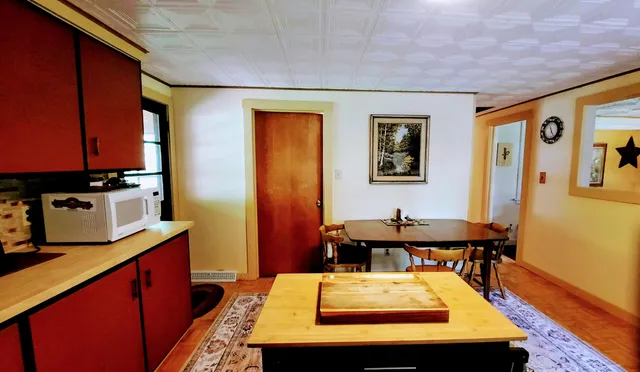 $420,000 | 8424 3rd Street, Onekama, MI 49675