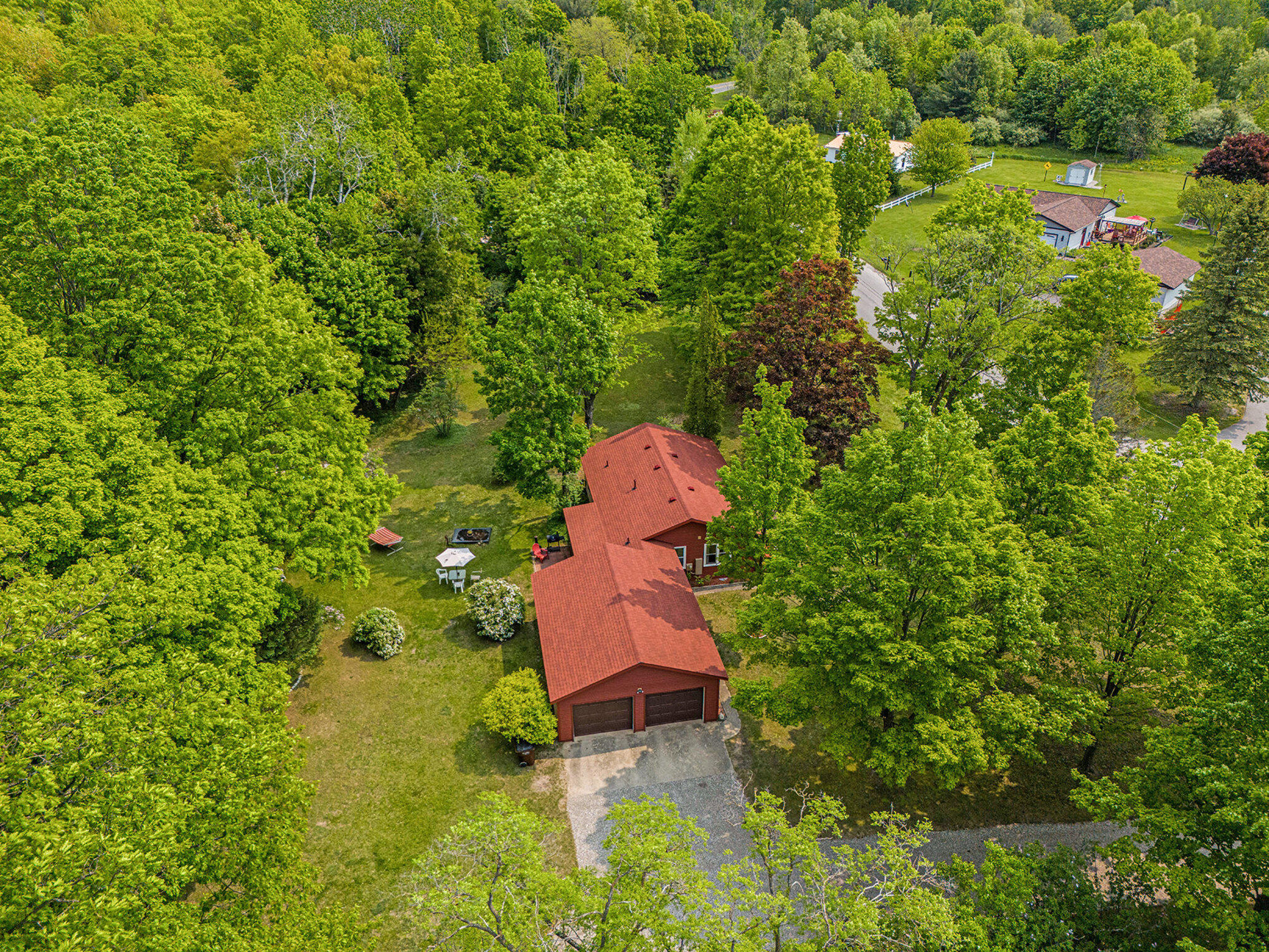 8424 3rd Street Onekama, MI 49675 - Photo 3 of 77 1.5+ Acres Park-Like Setting