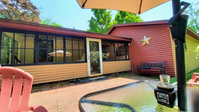 $420,000 | 8424 3rd Street, Onekama, MI 49675