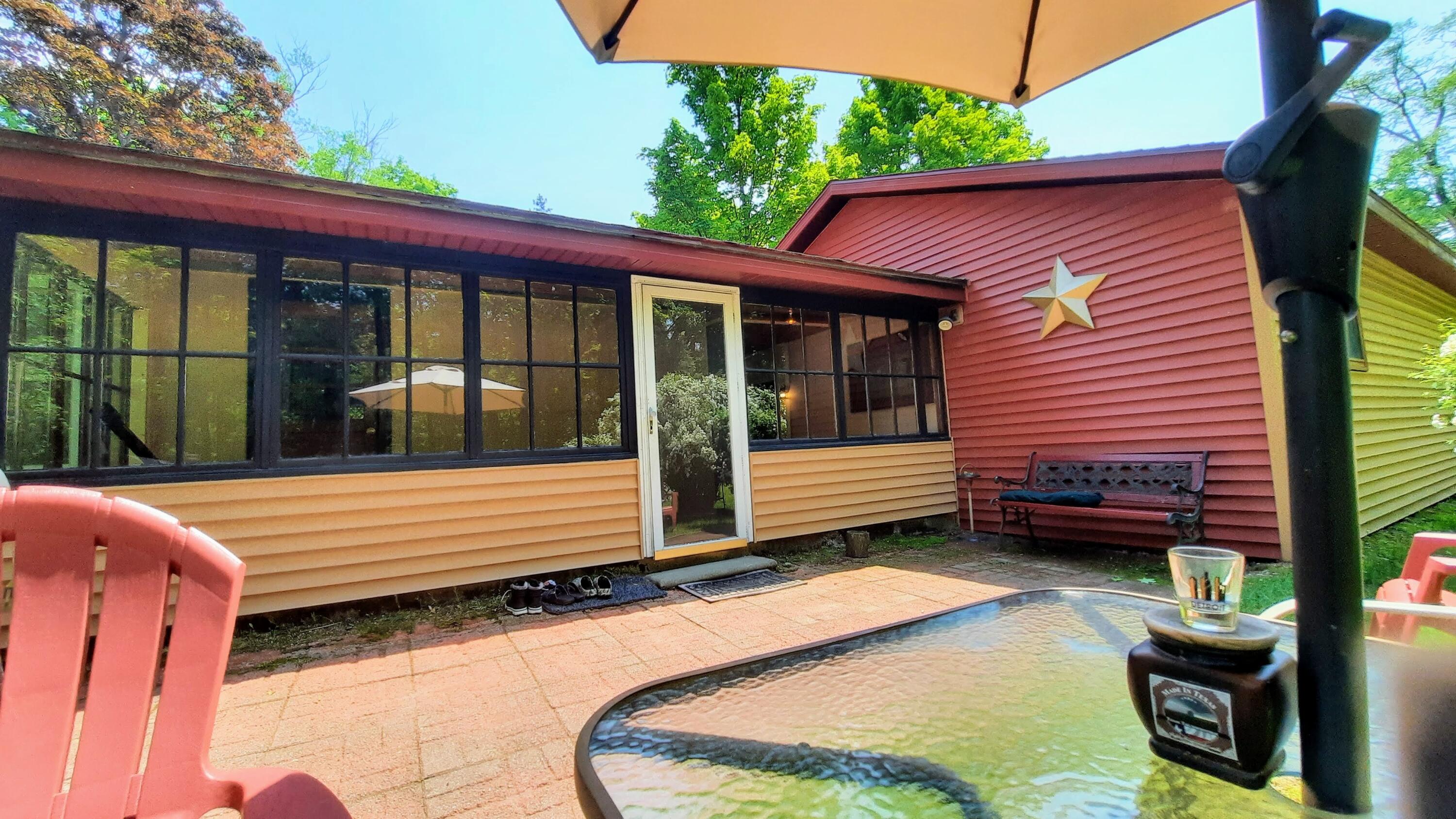 8424 3rd Street Onekama, MI 49675 - Photo 47 of 77 Back Patio