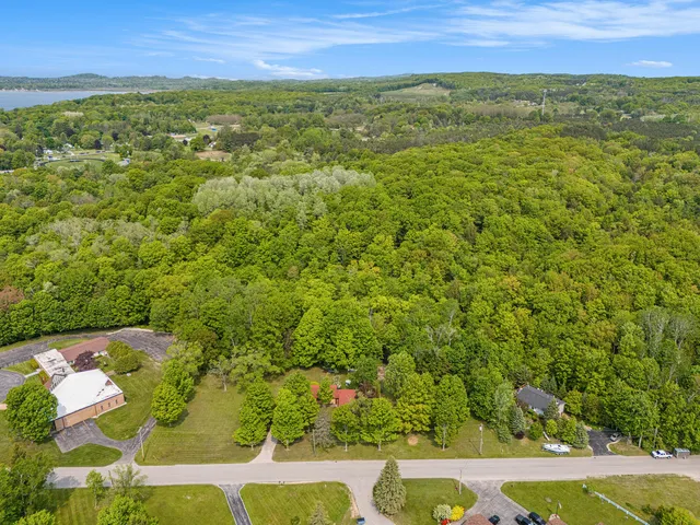 $420,000 | 8424 3rd Street, Onekama, MI 49675