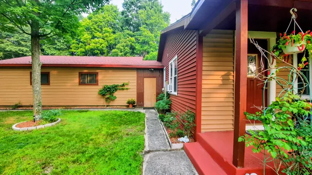 $420,000 | 8424 3rd Street, Onekama, MI 49675