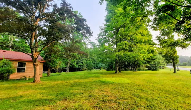 $420,000 | 8424 3rd Street, Onekama, MI 49675