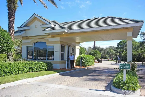 a view of a building with a garden