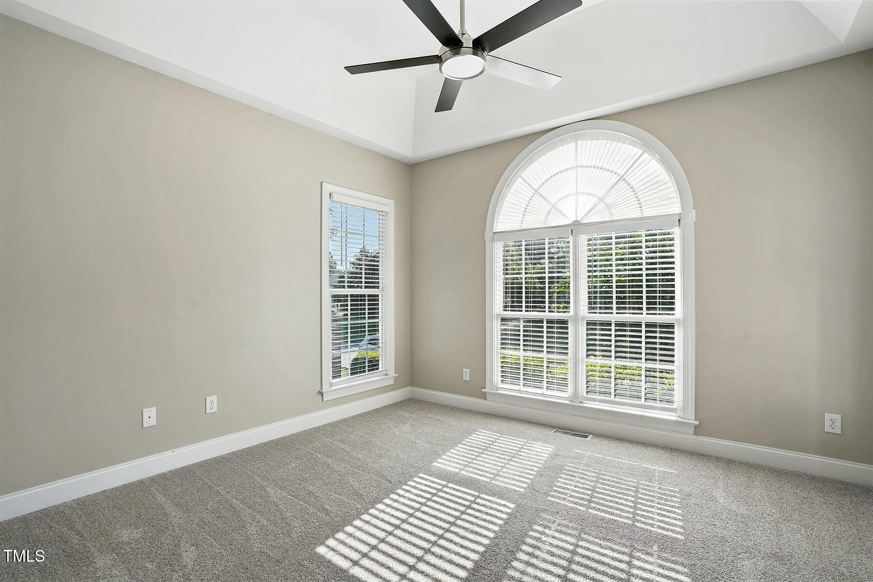 104 Vatersay Drive Apex, NC 27502 - Photo 14 of 30 a view of an empty room with a window