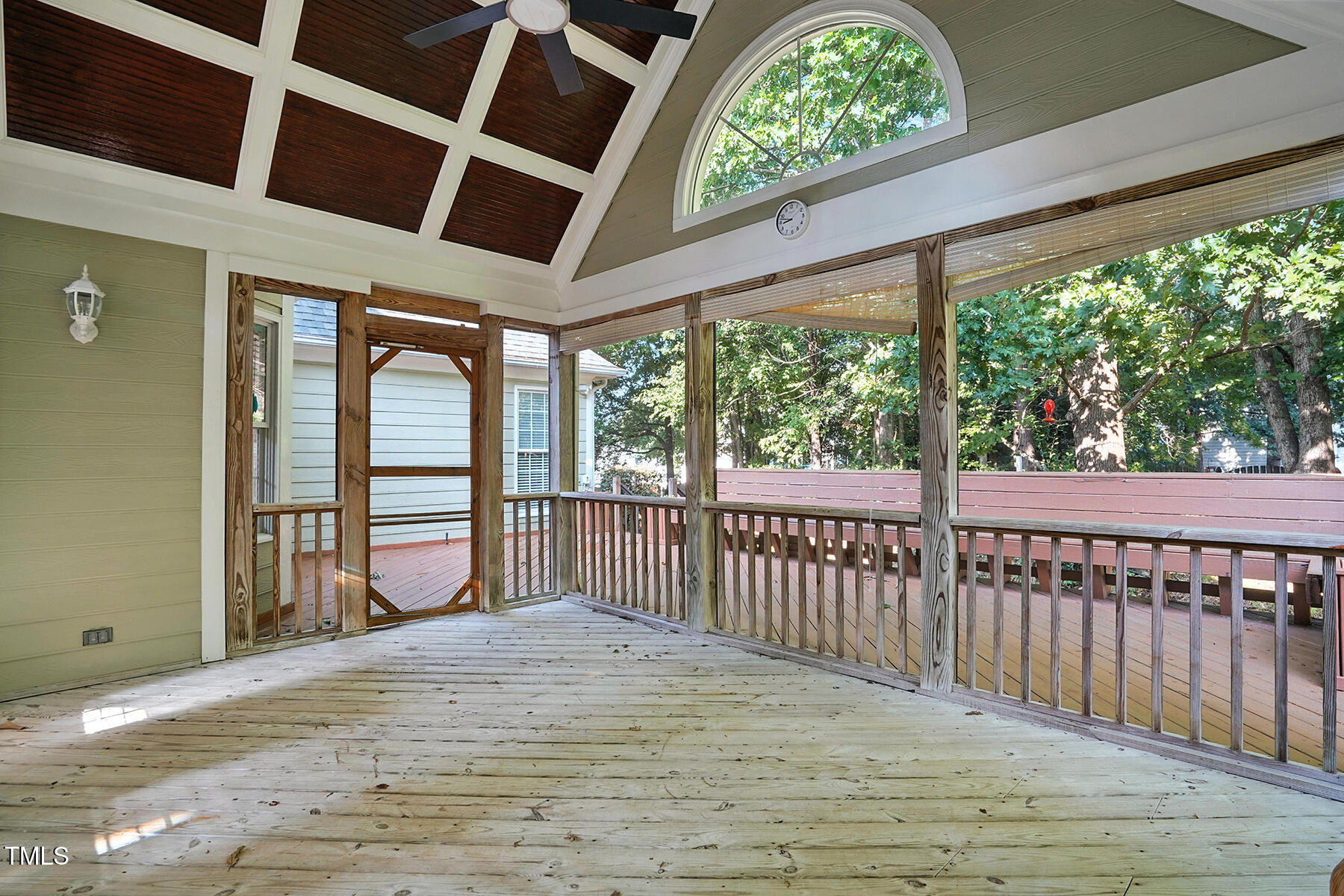104 Vatersay Drive Apex, NC 27502 - Photo 24 of 30 a view of a balcony with wooden floor