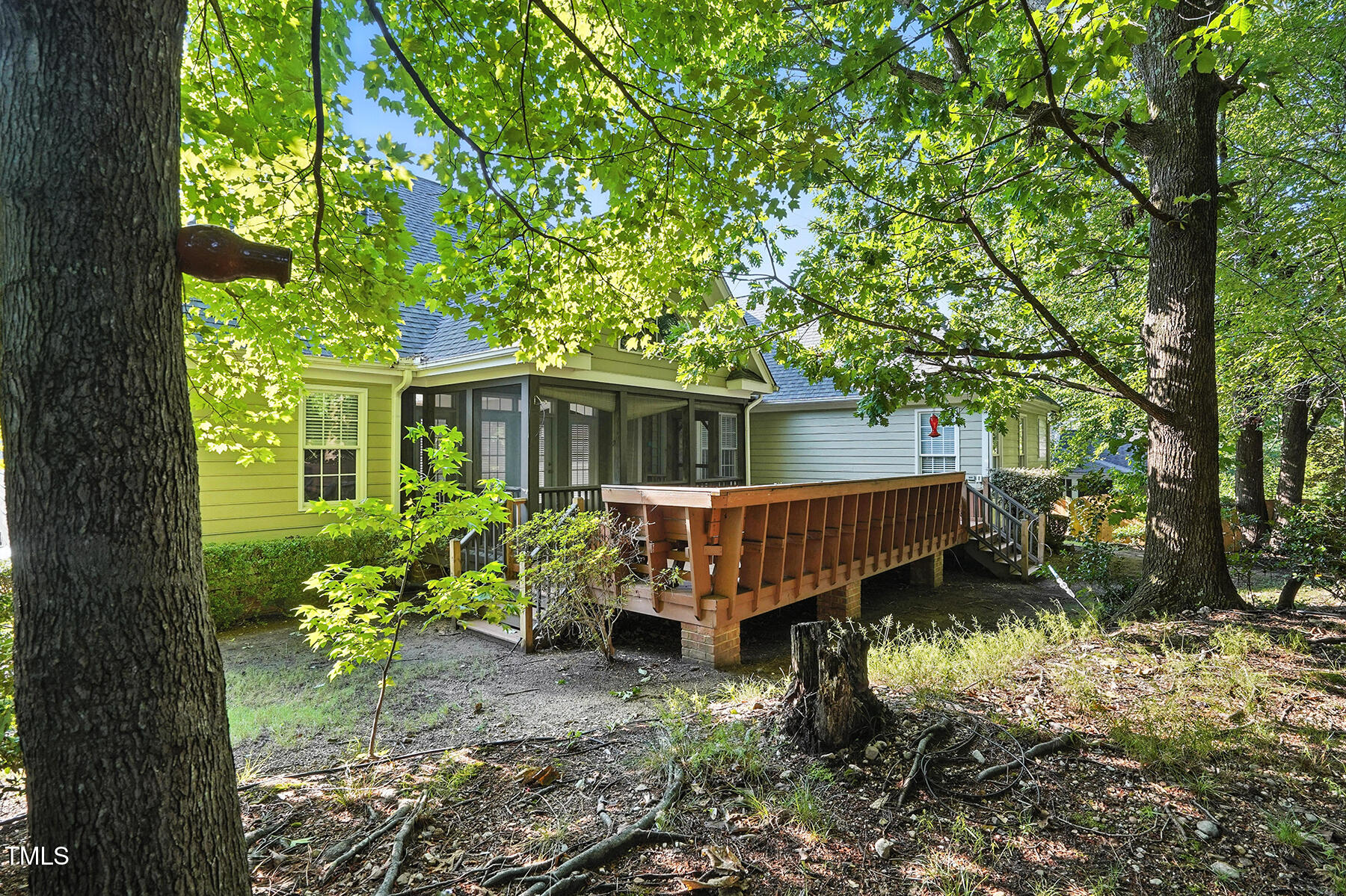 104 Vatersay Drive Apex, NC 27502 - Photo 28 of 30 a view of a house with a yard and sitting area