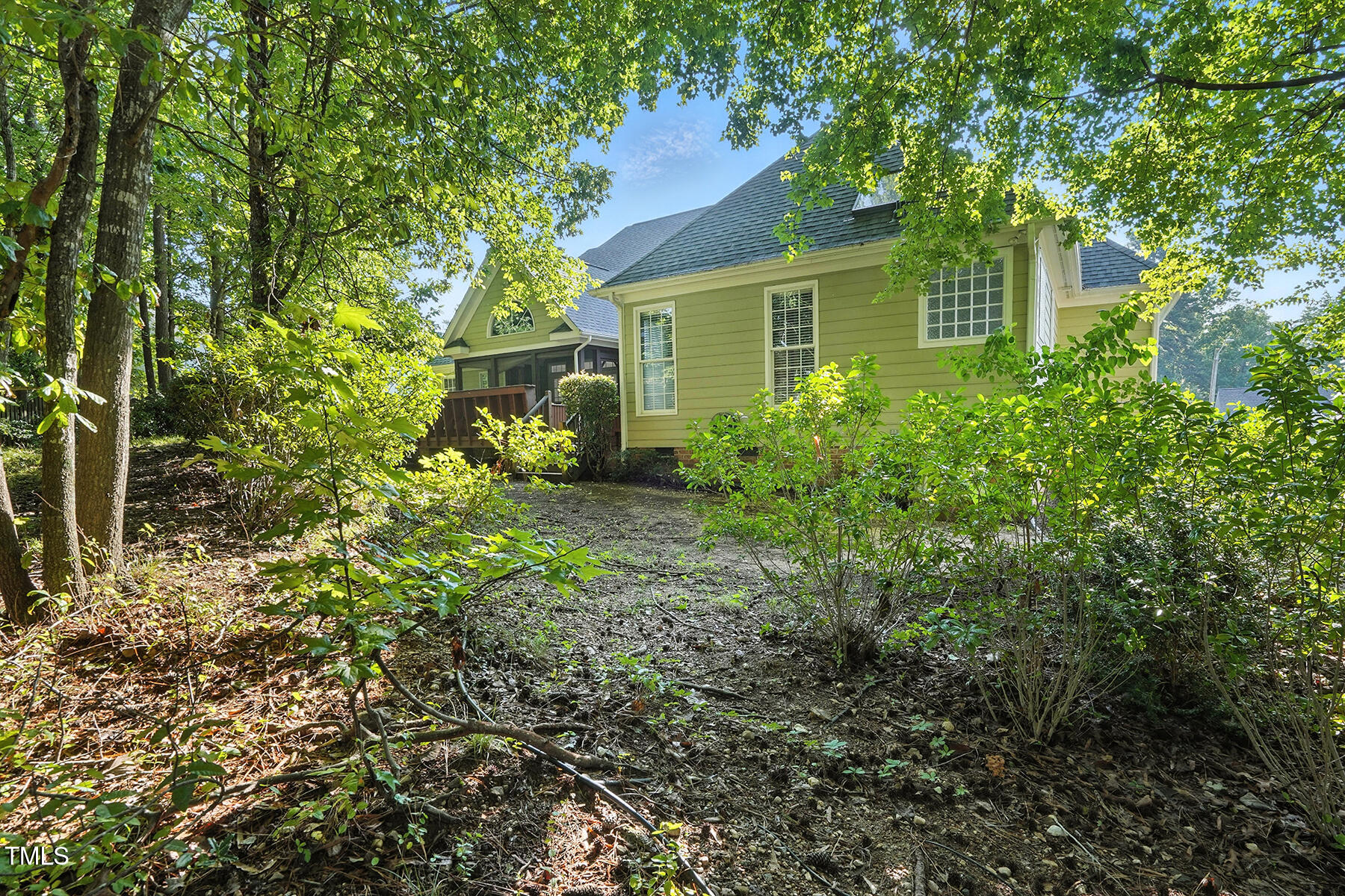 104 Vatersay Drive Apex, NC 27502 - Photo 29 of 30 a view of a house with a yard and sitting area