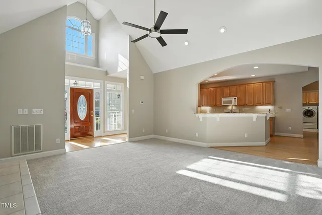 a view of a kitchen with a sink and a window