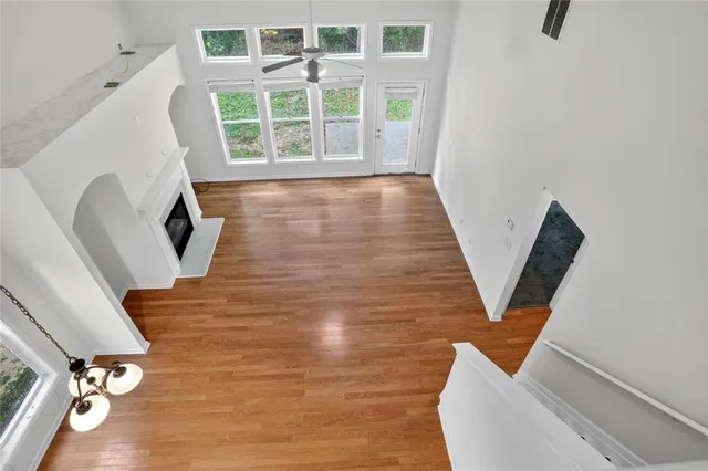 a view of a living room with furniture and a window