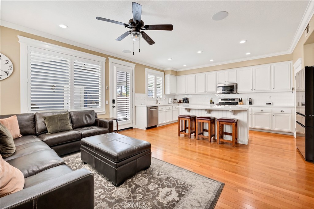 40152 Stowe Road Temecula, CA 92591 - Photo 15 of 56 a living room with stainless steel appliances furniture and a large window