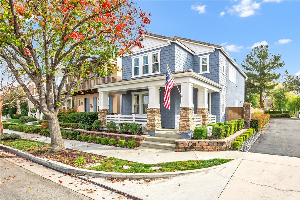 40152 Stowe Road Temecula, CA 92591 - Photo 2 of 56 a front view of a house with a yard